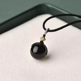 Natural Obsidian Pendant - A Sphere of Infinite Answers